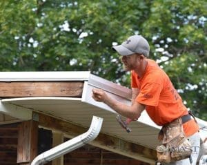 Roofer Completing Home Repair Services
